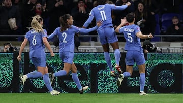 France's forward #11 Kadidiatou Diani (2ndR) celebrates with teammates after she scored his team's first goal during the UEFA Women's Nations League football match between France and Germany at The Groupama Stadium in Decines-Charpieu, central-eastern France on February 23, 2024. (Photo by FRANCK FIFE / AFP)
