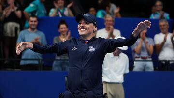 Bronze medallist Chile's Alberto Caroly Abarza Diaz celebrates on the podium of the men's S2 100m backstroke swimming event during the Paris 2024 Paralympic Games at The Paris La Defense Arena in Nanterre, west of Paris on August 29, 2024. (Photo by FRANCK FIFE / AFP)