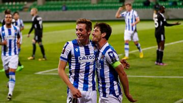 Real Sociedad's Spanish defender Jon Pacheco and Real Sociedad's Spanish defender Aritz Elustondo celebrate a goal during the UEFA Europa League group E football match between Sheriff and Real Sociedad at Zimbru stadium in Chisinau on October 6, 2022. (Photo by BOGDAN TUDOR / AFP)