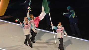 Mexico's flag bearer Donovan Carrillo parades with other athletes during the opening ceremony of the Milano Cortina 2026 Winter Olympic Games at the San Siro stadium in Milan, northern Italy, on February 6, 2026. (Photo by Piero CRUCIATTI / AFP)