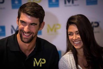 Michael Phelps y Nicole Johnson.