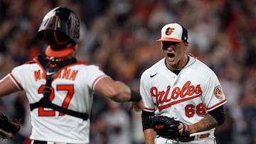 BALTIMORE, MARYLAND - SEPTEMBER 28: Pitcher Tyler Wells #68 and catcher James McCann #27 of the Baltimore Orioles celebrate after the Orioles defeated the Boston Red Sox to win the the American League Eastat Oriole Park at Camden Yards on September 28, 2023 in Baltimore, Maryland.   Rob Carr/Getty Images/AFP (Photo by Rob Carr / GETTY IMAGES NORTH AMERICA / Getty Images via AFP)