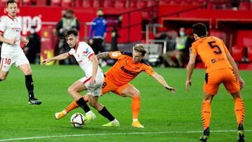 Munir El Haddadi of Sevilla and Daniel Wass of Valencia during 1/8 round of Copa del Rey, football match played between Sevilla Futbol Club and Valencia Club de Futbol at Ramon Sanchez Pizjuan Stadium on January 27, 2021 in Sevilla, Spain.
 AFP7 
 27/01/2