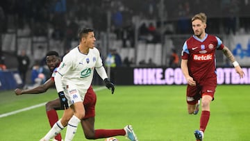 Marseille's Chilean forward Alexis Sanchez runs with the ball (2nd L) during the French Cup quarter-final football match between Olympique de Marseille (OM) and Annecy at the Velodrome stadium in Marseille, southern France, on March 1, 2023. (Photo by Nicolas TUCAT / AFP)