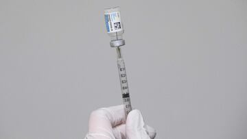 (FILES) In this file photo taken on March 13, 2021, a syringe is filled with a dose of the Johnson &amp; Johnson Janssen Covid-19 vaccine at a vaccination site in Delano, California. - The United States has agreed to send coronavirus vaccines to Mexico af