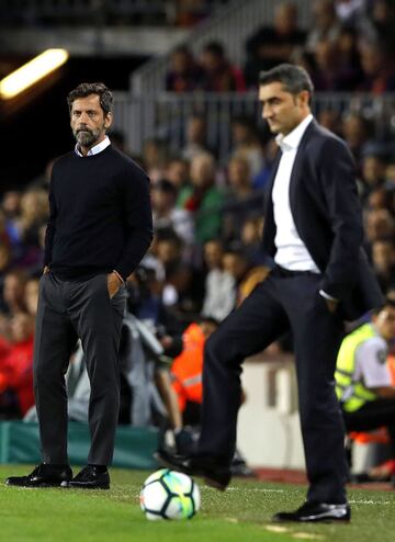 El entrenador del RCD Espanyol Quique Sánchez Flores y Ernesto Valverde, entrenador del FC Barcelona