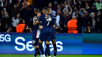 PARIS, FRANCE - OCTOBER 25: Neymar Jr of Paris Saint-Germain is congratulated by teammates Leo Messi and Kylian Mbappe after scoring during the UEFA Champions League group H match between Paris Saint-Germain and Maccabi Haifa FC at Parc des Princes on October 25, 2022 in Paris, France. (Photo by Aurelien Meunier - PSG/PSG via Getty Images)