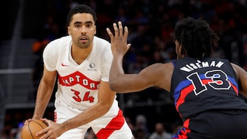 FILE PHOTO: Mar 13, 2024; Detroit, Michigan, USA; Toronto Raptors center Jontay Porter (34) is defended by Detroit Pistons center James Wiseman (13) in the second half at Little Caesars Arena. Mandatory Credit: Rick Osentoski-USA TODAY Sports/File Photo