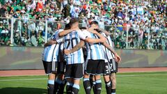 Argentina's midfielder Enzo Fernandez (Covered) celebrates with teammates after scoring his team's first goal during the 2026 FIFA World Cup South American qualifiers football match between Bolivia and Argentina, at the Hernando Siles stadium in La Paz, on September 12, 2023. (Photo by Jorge Bernal / AFP)