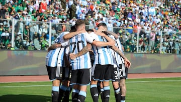 Argentina's midfielder Enzo Fernandez (Covered) celebrates with teammates after scoring his team's first goal during the 2026 FIFA World Cup South American qualifiers football match between Bolivia and Argentina, at the Hernando Siles stadium in La Paz, on September 12, 2023. (Photo by Jorge Bernal / AFP)