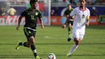 Jun 27, 2015; Orlando, FL, USA; Mexico forward Carlos Vela (11) dribbles the ball as Costa Rica forward Bryan Ruiz (10) defends during the first half at Orlando Citrus Bowl. Mandatory Credit: Kim Klement-USA TODAY Sports