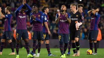 Barcelona players celebrate at the end of the Spanish league football match between FC Barcelona and Real Madrid CF at the Camp Nou stadium in Barcelona on October 28, 2018.