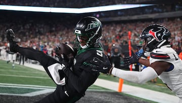 The initial call was an incomplete pass, but the video replay confirmed that Wilson’s shin was down in the end zone, resulting in a New York Jets touchdown.