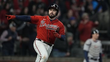 Atlanta Braves&#039; Travis d&#039;Arnaud celebrates his home run during the eighth inning in Game 3 of baseball&#039;s World Series between the Houston Astros and the Atlanta Braves Friday, Oct. 29, 2021, in Atlanta. (AP Photo/Brynn Anderson)