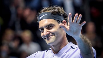 (FILES) In this file photo taken on October 24, 2017 Switzerland's Roger Federer celebrates after winning against Frances Tiafoe of the US at the Swiss Indoors ATP 500 tennis tournament in Basel. - Swiss tennis legend Roger Federer is to retire after next week's Laver Cup, he said on September 15, 2022. (Photo by Fabrice COFFRINI / AFP)