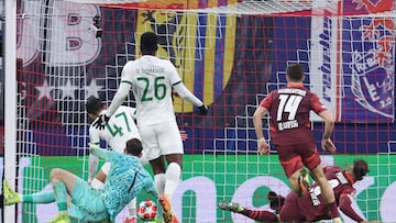 Leipzig's Danish forward #09 Yussuf Poulsen (R) scores the 2-1 goal during the UEFA Champions League football match between RB Leipzig and Sporting CP in Leipzig, eastern Germany on January 22, 2025. (Photo by Ronny HARTMANN / AFP)