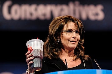 Sarah Palin, former Governor of Alaska, holds up a large soda as she speaks about New York City Mayor Michael Bloomberg's proposed large soda ban, at the 2013 Conservative Political Action Conference in National Harbor, Maryland.