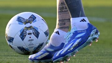 Detail of the football boots of Argentina's forward Lionel Messi taken during a training session in Ezeiza, Buenos Aires Province, on November 14, 2023, ahead of the FIFA World Cup 2026 qualifier football matches against Uruguay and Brazil. (Photo by Juan MABROMATA / AFP)