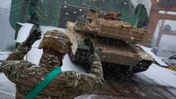 A U.S. soldier from U.S. 2nd Armored Brigade Combat Team (ABCT) directs military equipment which arrived in the Polish port of Gdynia as part of NATO's Operation Atlantic Resolve in Gdynia, Poland December 3, 2022. REUTERS/Kacper Pempel