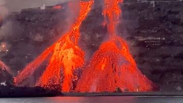 Lava flows as the Cumbre Vieja volcano continues to erupt on the Canary Island of La Palma, Spain, November 9, 2021, in this still image obtained from a social media video. Video recorded November 9, 2021. Involcan/via REUTERS THIS IMAGE HAS BEEN SUPPLIED