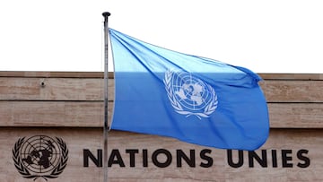 FILE PHOTO: A flag is seen on a building during the Human Rights Council at the United Nations in Geneva, Switzerland February 27, 2023. REUTERS/Denis Balibouse/File Photo