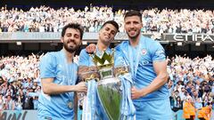 Bernardo Silva, Joao Cancelo y Ruben Dias con el Manchester City