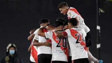 Argentina's River Plate players celebrate after scoring a goal against Brazil's Fortaleza during their Copa Libertadores group stage first leg football match, at the Monumental Stadium in Buenos Aires on April 13, 2022. (Photo by Juan Mabromata / AFP)