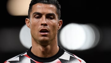 Manchester United's Portuguese striker Cristiano Ronaldo reacts during the warm up prior to the English Premier League football match between Manchester United and Tottenham Hotspur at Old Trafford in Manchester, north west England, on October 19, 2022. (Photo by Oli SCARFF / AFP) / RESTRICTED TO EDITORIAL USE. No use with unauthorized audio, video, data, fixture lists, club/league logos or 'live' services. Online in-match use limited to 120 images. An additional 40 images may be used in extra time. No video emulation. Social media in-match use limited to 120 images. An additional 40 images may be used in extra time. No use in betting publications, games or single club/league/player publications. / 