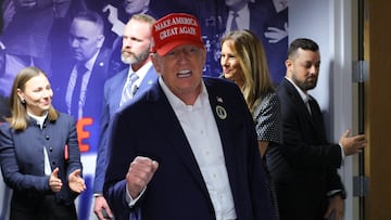 Republican presidential nominee and former U.S. President Donald Trump, accompanied by former U.S. first lady Melania Trump, visits his campaign headquarters to thank the campaign workers on Election Day, in West Palm Beach, Florida, U.S., November 5, 2024. REUTERS/Brian Snyder