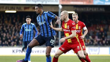 Ajax Amsterdam's Ivorian forward Sebastien Haller (L) fights for the ball with Go Ahead Eagles' German defender Gerrit Nauber during the French L1 football match between ES Troyes AC and Olympique de Marseille at Stade de l'Aube in Troyes,
