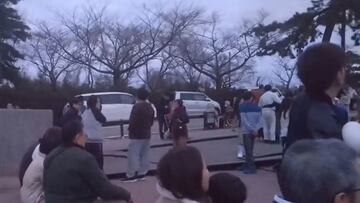 People evacuate to higher ground at a parking space of a junior high school after a tsunami warning issued caused by an earthquake in Wajima, Ishikawa prefecture, Japan January 1, 2024, in this still image from a video released by Kyodo. Mandatory credit Kyodo via REUTERS ATTENTION EDITORS - THIS IMAGE WAS PROVIDED BY A THIRD PARTY. MANDATORY CREDIT. JAPAN OUT. NO COMMERCIAL OR EDITORIAL SALES IN JAPAN