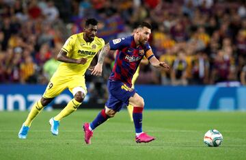 Leo Messi y Andre Zambo Anguissa.