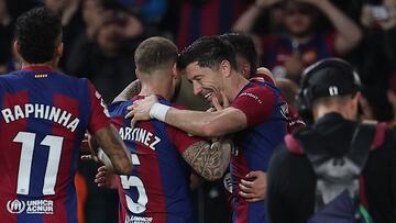 Barcelona's Polish forward #09 Robert Lewandowski celebrates scoring his team's second goal during the Spanish league football match between FC Barcelona and Deportivo Alaves at the Estadi Olimpic Lluis Companys in Barcelona on November 12, 2023. (Photo by LLUIS GENE / AFP)