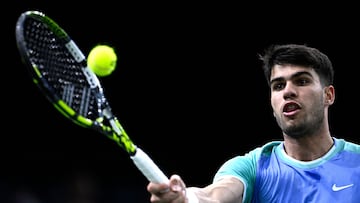 Spain's Carlos Alcaraz plays a forehand return to Chile's Nicolas Jarry during their men's singles match on day two of the Paris ATP Masters 1000 tennis tournament at the Accor Arena - Palais Omnisports de Paris-Bercy - in Paris on October 29, 2024. (Photo by JULIEN DE ROSA / AFP)