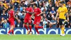 LIVERPOOL, ENGLAND - MAY 22: Sadio Mane of Liverpool celebrates with team mates Thiago Alcantara and Luis Diaz of Liverpool after scoring their sides first goal during the Premier League match between Liverpool and Wolverhampton Wanderers at Anfield on May 22, 2022 in Liverpool, England. (Photo by Alex Livesey/Getty Images)
