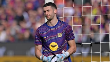 Barcelona's Spanish goalkeeper #13 Joan Garcia warms up before the Spanish league football match between FC Barcelona and Villarreal CF at Camp Nou Stadium in Barcelona on February 28, 2026. (Photo by MANAURE QUINTERO / AFP)