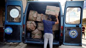 A man loads a truck with new coffins during the outbreak of the coronavirus disease (COVID-19), in Lima, Peru June 16, 2020. Picture taken June 16, 2020. REUTERS/Sebastian Castaneda NO RESALES. NO ARCHIVES