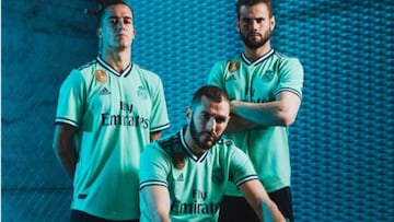 Lucas Vazques, Karim Benzema and Nacho in the green away kit.