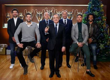 Sergio Llull, Felipe Reyes, Pablo Laso, Florentino Pérez, Zinedine Zidane, Sergio Ramos y Marcelo.