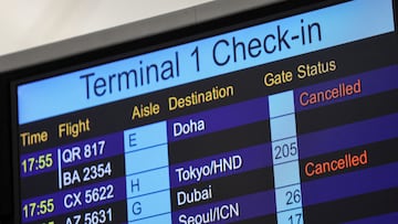 A screen displays cancelled flights to Middle East destinations at the Hong Kong International Airport in Hong Kong, China, March 2, 2026. REUTERS/Tyrone Siu TPX IMAGES OF THE DAY
