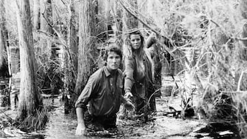 LOS ANGELES - CIRCA 1986--Eddie Jillette (Richard Gere) leads Michel (Kim Basinger) through the swamps of the Louisiana Bayou as Eddie tries to track down a killer and come out alive. (Photo by Images/Getty Images)
