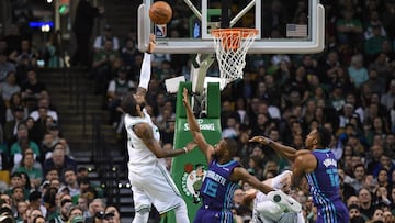 Feb 28, 2018; Boston, MA, USA; Boston Celtics guard Kyrie Irving (11) shoots the ball over Charlotte Hornets guard Kemba Walker (15) during the first half at TD Garden. Mandatory Credit: Bob DeChiara-USA TODAY Sports