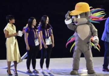 Artists perform with the offical mascot, Pachi (R), during the opening ceremony for the 2015 Pan American Games at the Rogers Centre in Toronto, Ontario, on July 10, 2015. AFP PHOTO/OMAR TORRES