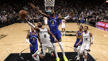 Apr 25, 2019; San Antonio, TX, USA; San Antonio Spurs point guard Patty Mills (8) shoots the ball as Denver Nuggets shooting guard Will Barton (5) defends in game six of the first round of the 2019 NBA Playoffs at AT&amp;T Center. Mandatory Credit: Soobum Im-USA TODAY Sports