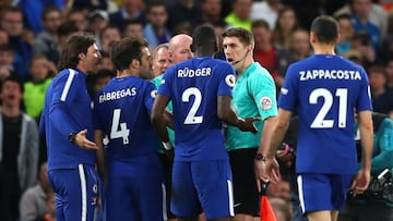 Chelsea charged over players crowding referee