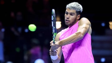 Spain's Carlos Alcaraz returns a shot against the US' Taylor Fritz during the semi-final of the Six Kings Slam exhibition tennis tournament in Riyadh on October 16, 2025. (Photo by Fayez NURELDINE / AFP)