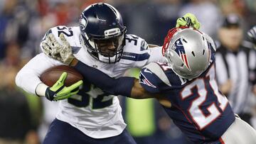 Nov 13, 2016; Foxborough, MA, USA;  Seattle Seahawks running back Christine Michael (32) is tackled by New England Patriots cornerback Malcolm Butler (21) during the fourth quarter at Gillette Stadium.  The Seattle Seahawks won 31-24.  Mandatory Credit: Greg M. Cooper-USA TODAY Sports