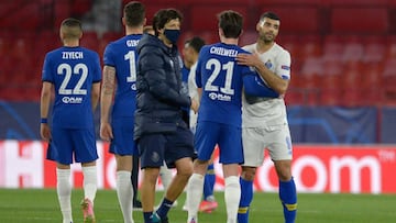 Chelsea's English defender Ben Chilwell (2R) congratulates FC Porto's Iranian forward Mehdi Taremi after the UEFA Champions League quarter final second leg football match between Chelsea and Porto at the Ramon Sanchez Pizjuan stadium in Seville