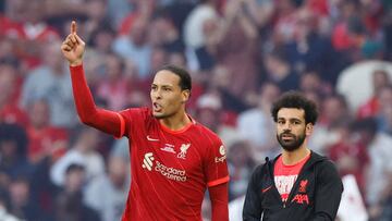 FILE PHOTO: Soccer Football - FA Cup - Final - Chelsea v Liverpool - Wembley Stadium, London, Britain - May 14, 2022 Liverpool's Mohamed Salah and Virgil van Dijk during the penalty shoot-out Action Images via Reuters/Peter Cziborra/File Photo