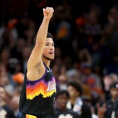 Devin Booker’s fist bump with a baby